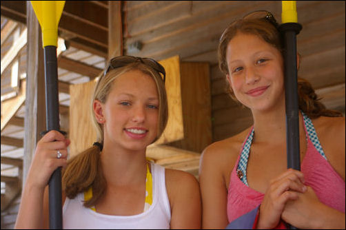 Taylor and Maddie waiting for to depart. Taylor and Maddie have their equipment and are ready to go.